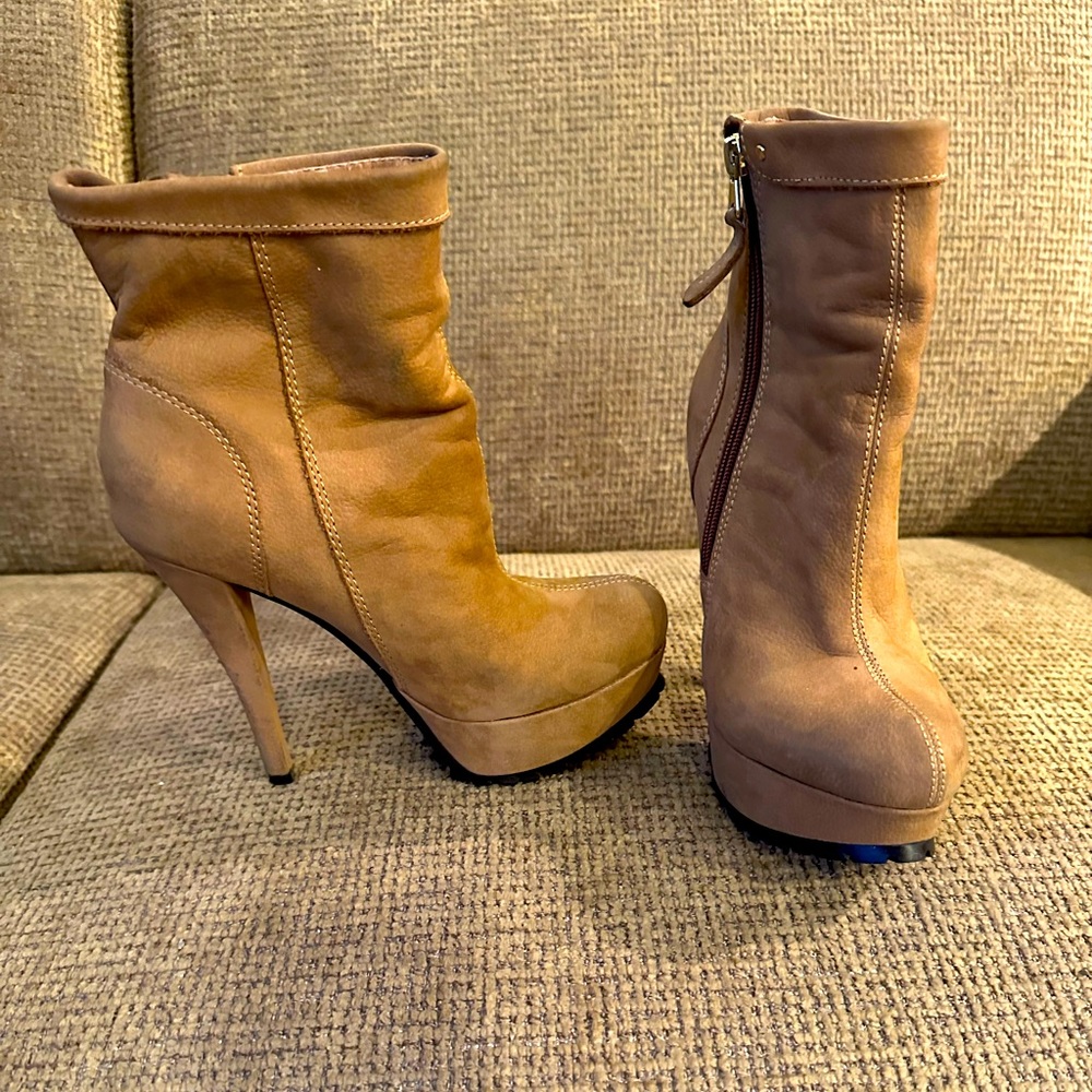 Distressed platform ankle bootie